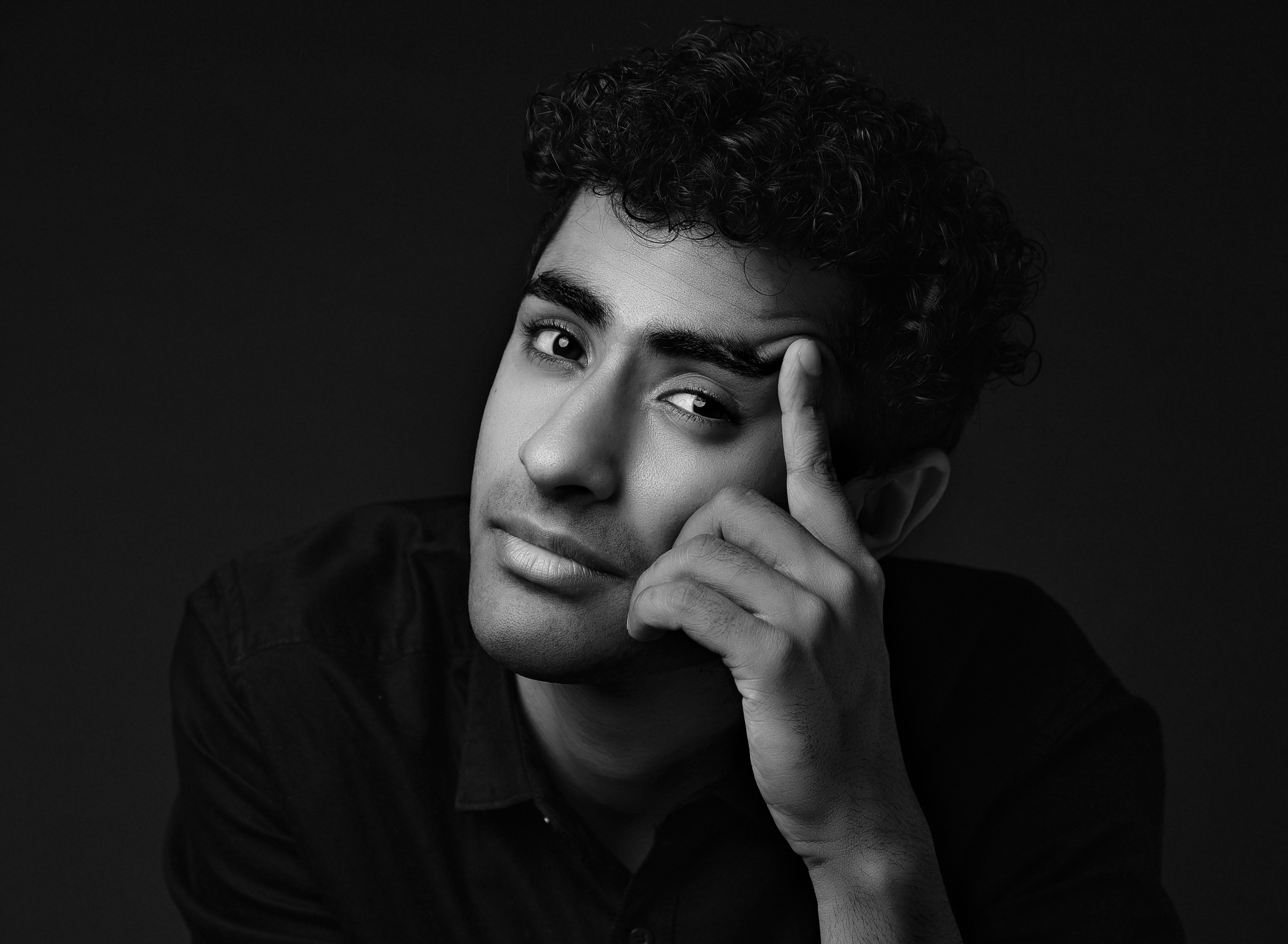 person standing near blue steel gate